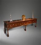 An exceptionally long 17th century oak low dresser