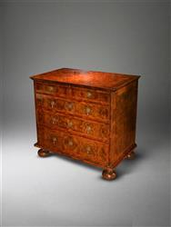 A William and Mary olivewood chest of drawers.