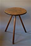 A George III West Country elm cricket table.