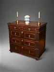 A Charles II walnut chest of drawers.