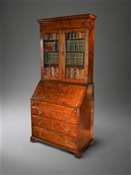 A George II burr elm breau bookcase.