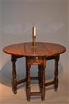 A very small Queen Anne gateleg table.