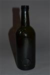 An early 19th century Trinity College wine bottle.