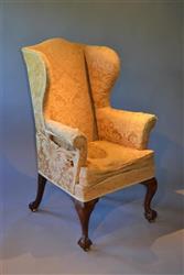 A small George II wing back armchair.