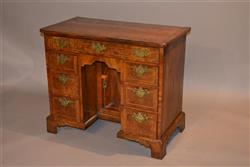 A George II walnut desk.