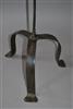 A wrought iron floor standing candle holder.  