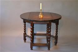 An unusal charles II oak gatgeleg tavern table.