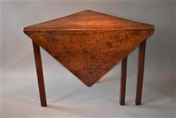 A rare Georgian fruitwood corner table.