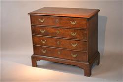 A very small Georgian oak chest of drawers.