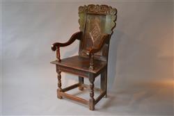 A mid 17th century West Country oak armchair.