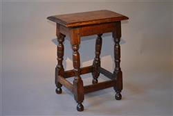 A mid 17th century oak joint stool.