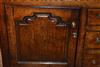 An early 18th century oak Welsh dresser and rack.