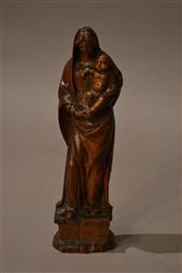 A 17th century boxwood Madonna and Child group.