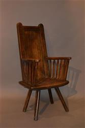 A superb 18th century primitive armchair.