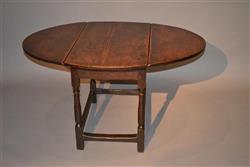 A late 17th century Welsh oak low tavern table.