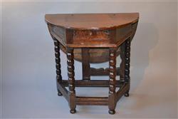 A small Charles II oak folding or credence table.