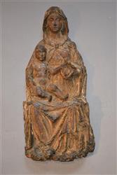 A 14th/15th century limewood relief.