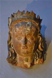 A 14th century carved head of The Virgin Mary..