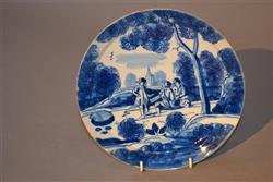 An early 18th century delft dished plate.