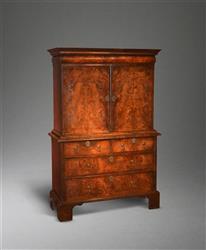 A small Queen Anne burr walnut cabinet on chest.