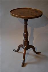 A George III oak candle stand.
