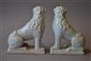 A pair of 18th century white tin glazed lions.