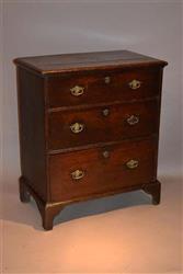 A very small early Georgian oak chest of drawers.