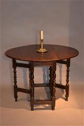 A very small Queen Anne gateleg table.