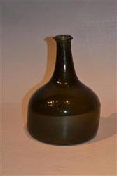 A good early 18th century English wine bottle.