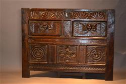 A mid 16th century oak chest front.