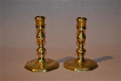 A  very small pair of Queen Anne  candlesticks.
