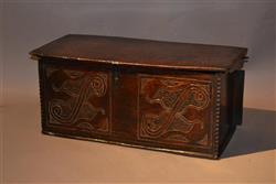 A late 17th century oak boarded box. 