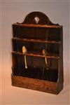 An early 18th century Welsh oak spoon rack.