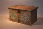 A very unusual 17th century oak boarded box.