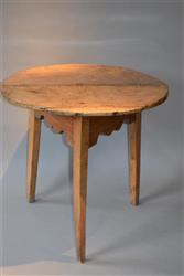 A George III sycamore top cricket table. 